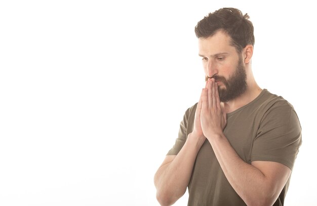 Picture of young bearded man dressed casually isolated