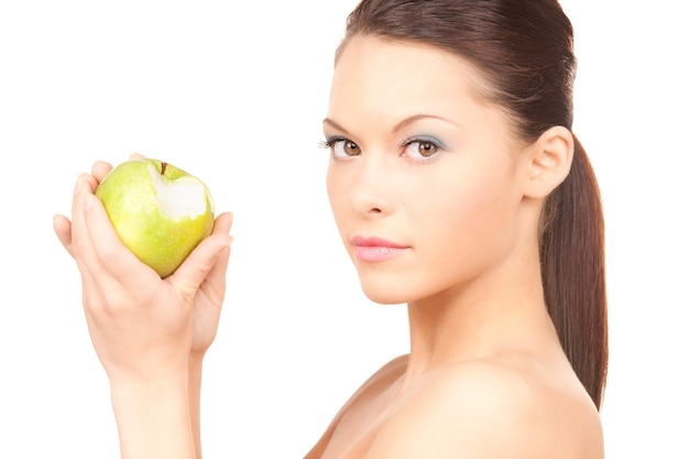 picture of young beautiful woman with green apple