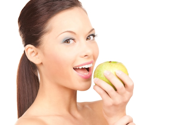 picture of young beautiful woman with green apple