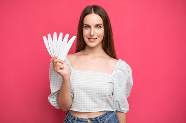 picture of young girl holding nail files