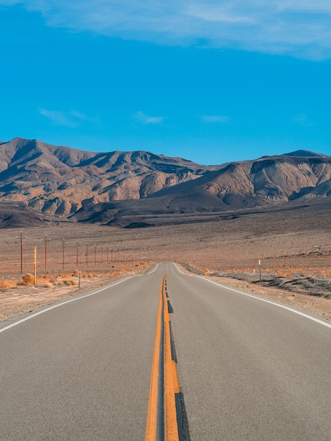 Picturesque empty road in the desert of Death Valley