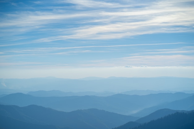 The picturesque foggy mountain landscape