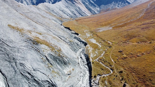 Picturesque mountain meadows gorge view of the Yarloo valley and dried riverbed aerial stock photography Altai Mountains