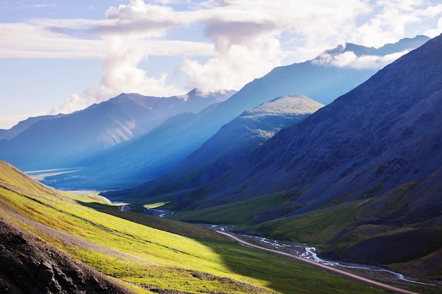 Picturesque Mountains of Alaska in summer. Snow covered massifs, glaciers and rocky peaks.