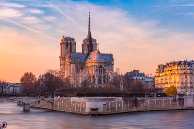 Picturesque sunset over cathedral of notre dame de paris destroyed in a fire in  paris france