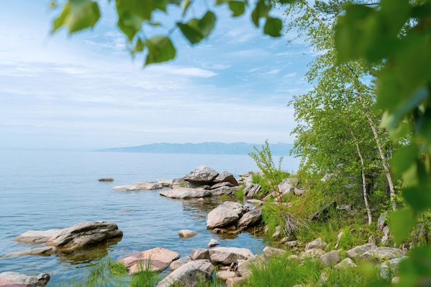 Picturesque view of Lake Baikal is a rift lake located in southern Siberia, Russia. The largest freshwater lake by volume in the world. A Natural Wonder Of The World.