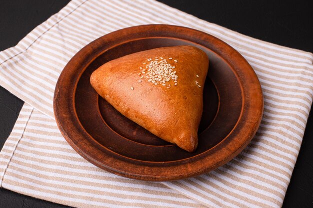 Pie pie on a black background georgian cuisine