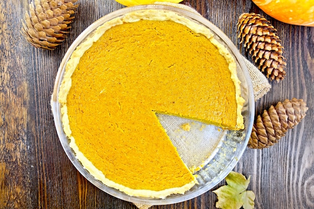 Pie pumpkin in glass pan on table top