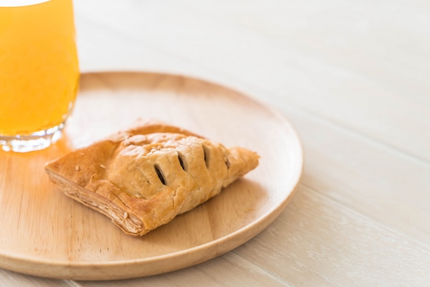 pie on wood plate