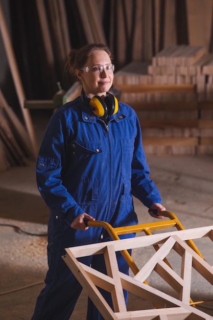 Piece of carved wood on hand truck