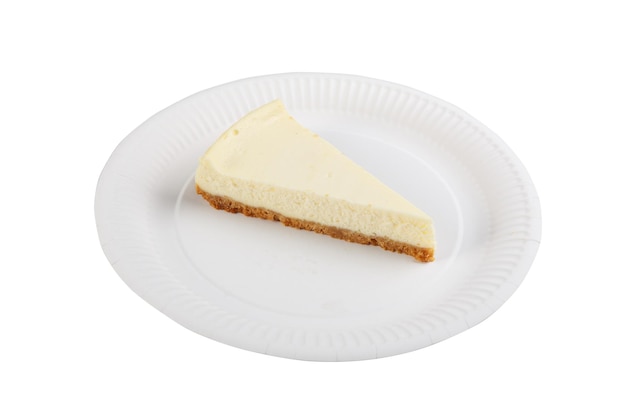 A piece of cheesecake on a paper plate