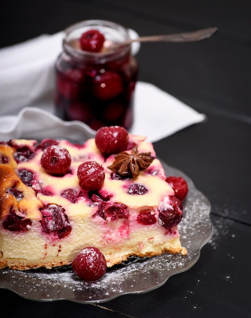 Piece of cheesecake with cherry berries 