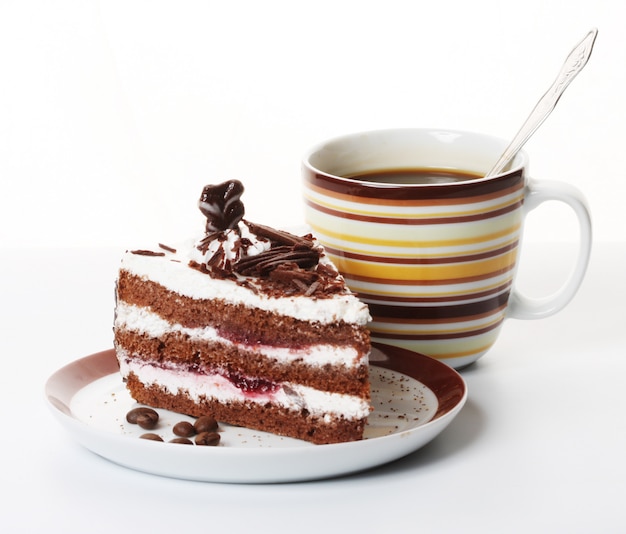 Piece of chocolate cake with coffee