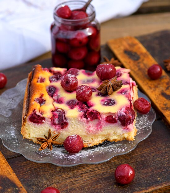 Piece of cottage cheese cake and cherry berries 