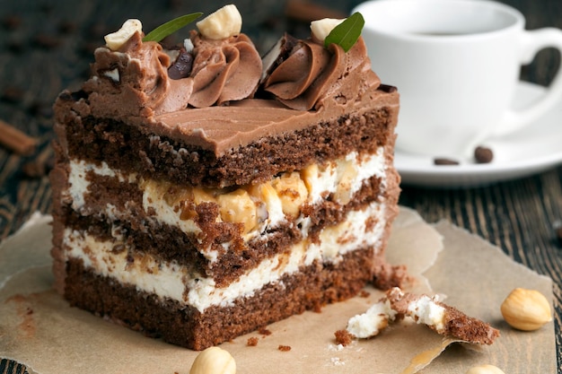 Piece of layered cake with nuts and caramel