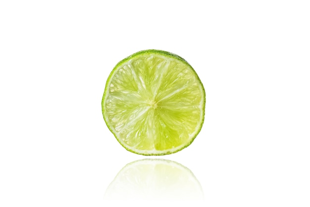 Piece of lime, slice, isolated on white background with drop shadow.