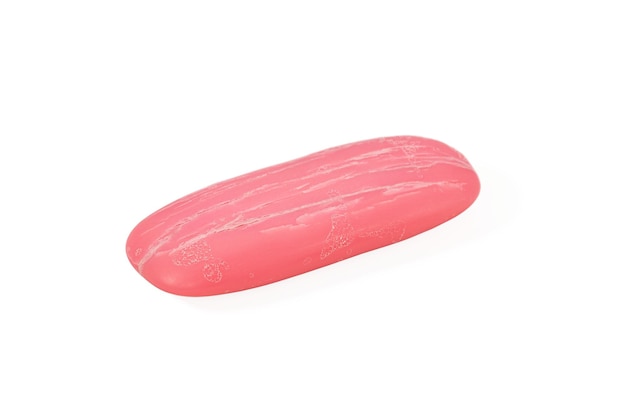 piece of pink used soap isolated on white background