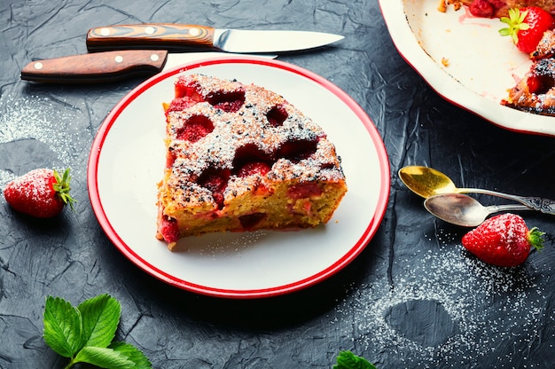 Piece of tasty homemade strawberry pie on a plate