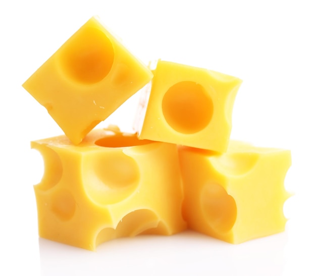 Pieces of cheese isolated on white