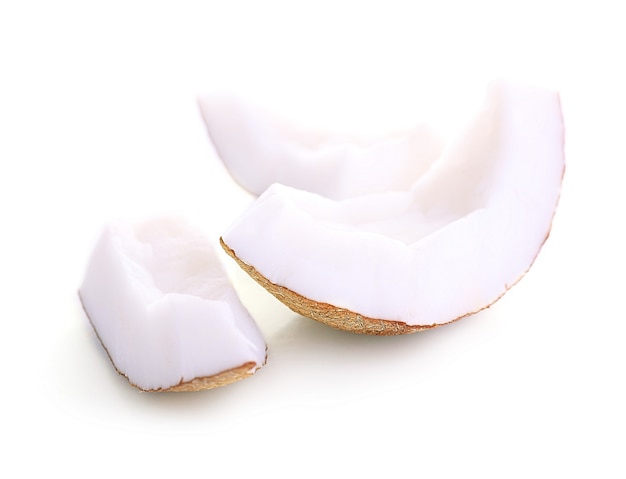 Pieces of coconut isolated on white