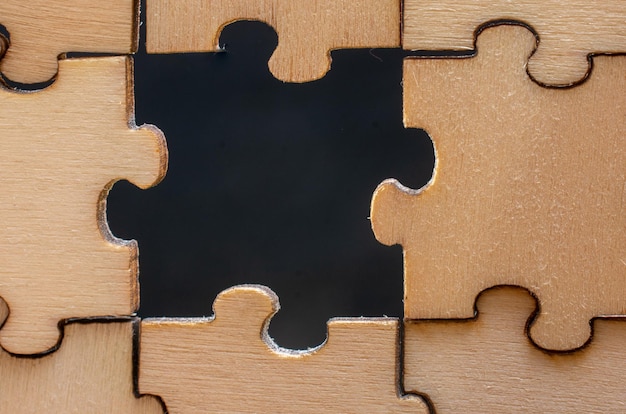 Pieces of jigsaw puzzle as business strategy concept