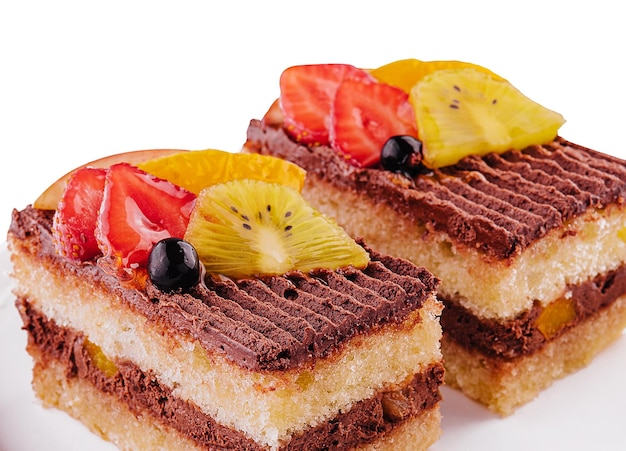 pieces of puff pastry cakes with strawberries and kiwi