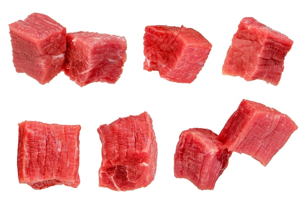 Pieces of raw beef Set of fresh beef cubes isolated on white background Isolate of beef cubes to insert into a design project or for an advertising banner High quality photo