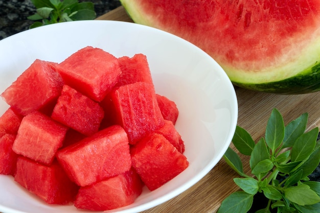 Pieces of watermelon in bowl Selective focus