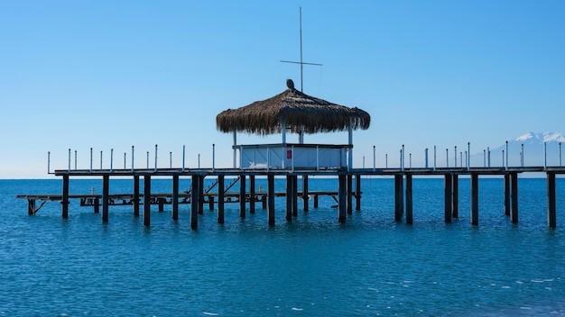 A pier on the beach and calming sea views