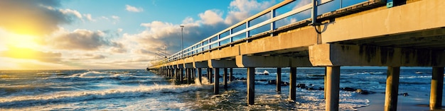 Pier and sea at sunset