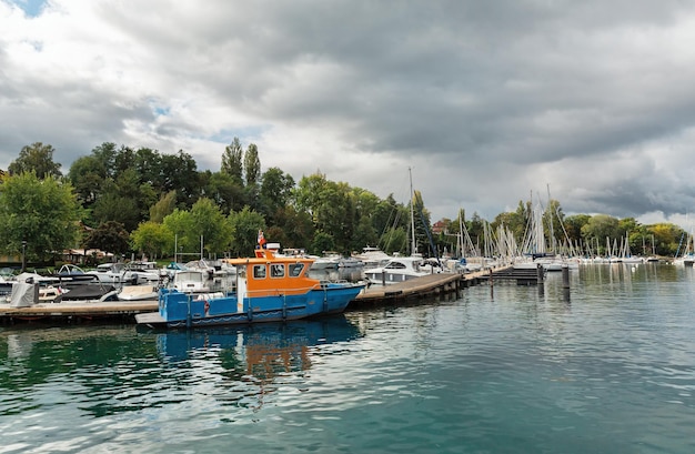 Pier with boats on Lake Geneva in Yvoire France