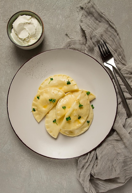 Pierogi a traditional dish of Polish cuisine dumplings top view closeup no people