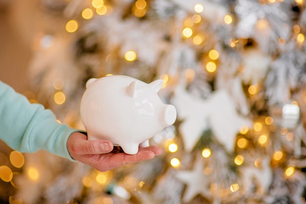 Piggy bank in festive christmas atmosphere