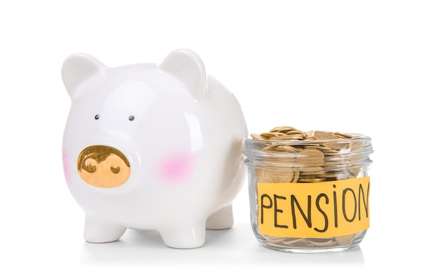 Piggy bank glass jar with label PENSION and coins on white background