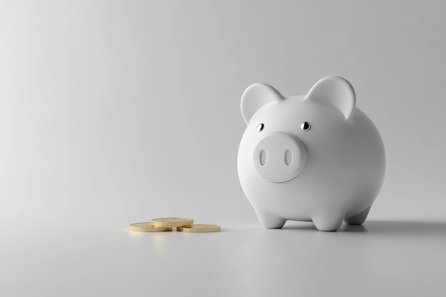 Piggy bank pig on a white background a coin is inserted from above