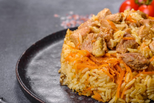 Pilaf or pilau with chicken traditional uzbek hot dish of boiled rice and chicken meat