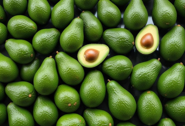 Photo a pile of avocados with avocados on top of them