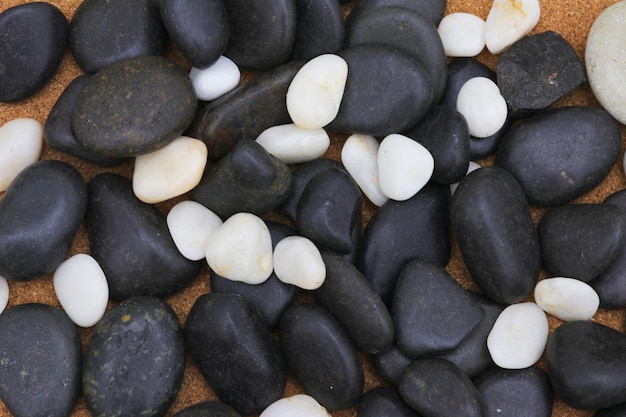 A pile of black and white pebbles