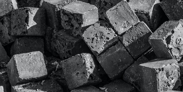 Photo a pile of bricks with the word brick on it