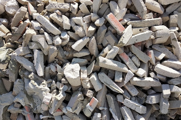 Pile of broken garbage plaster at construction site.