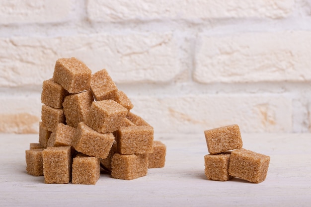 Pile of brown cane sugar cubes