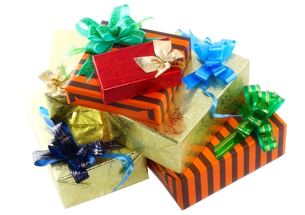 Pile of Christmas and New Year gift boxes. Isolated over white background