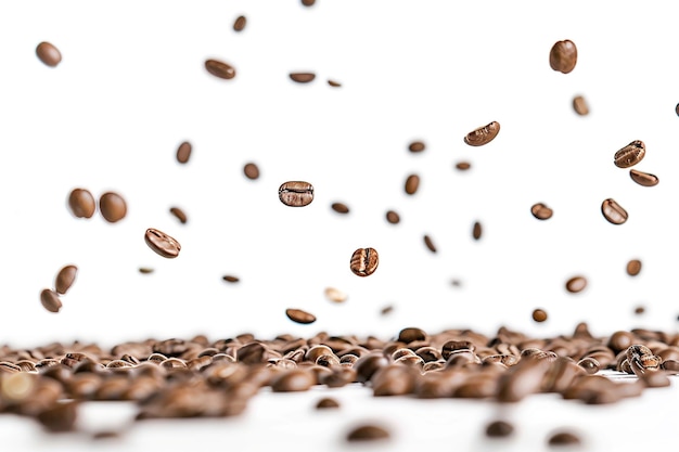 a pile of coffee beans with seeds falling down