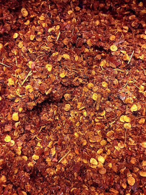 Pile crushed red cayenne pepper dried chili flakes and seeds