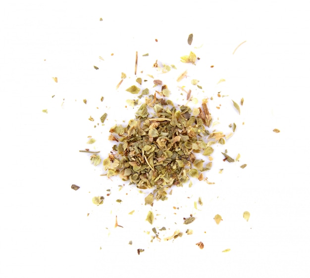 Pile of dried oregano isolated on white background