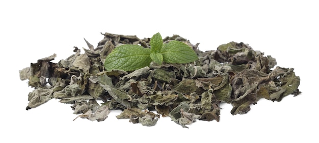 Pile of dry mint leaves isolated on white surface