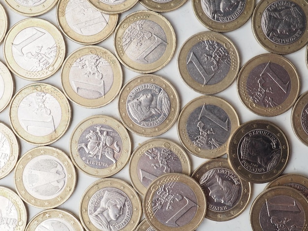 A pile of euro coins with the word euro on the top.