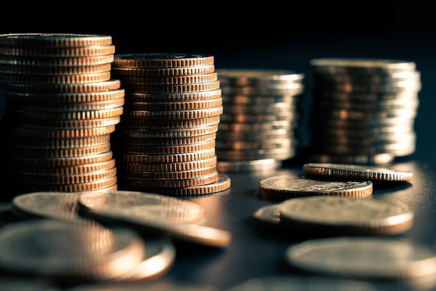 Pile of gold coins stack in finance treasury deposit bank account for saving