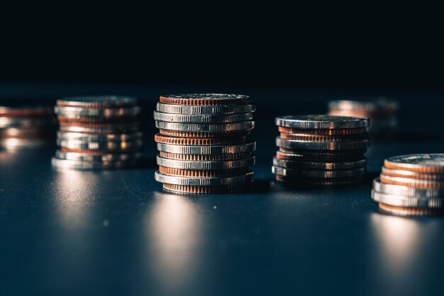 Pile of gold coins stack in finance treasury deposit bank account for saving