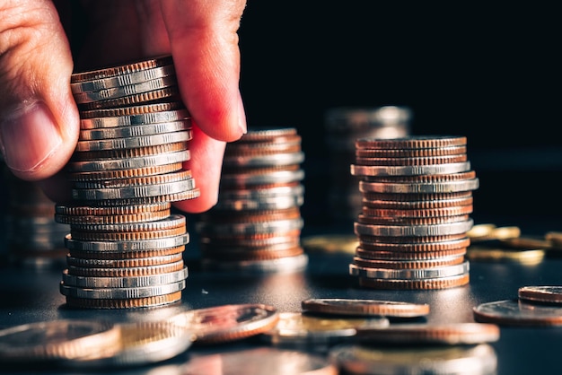 Pile of gold coins stack in finance treasury deposit bank account for saving